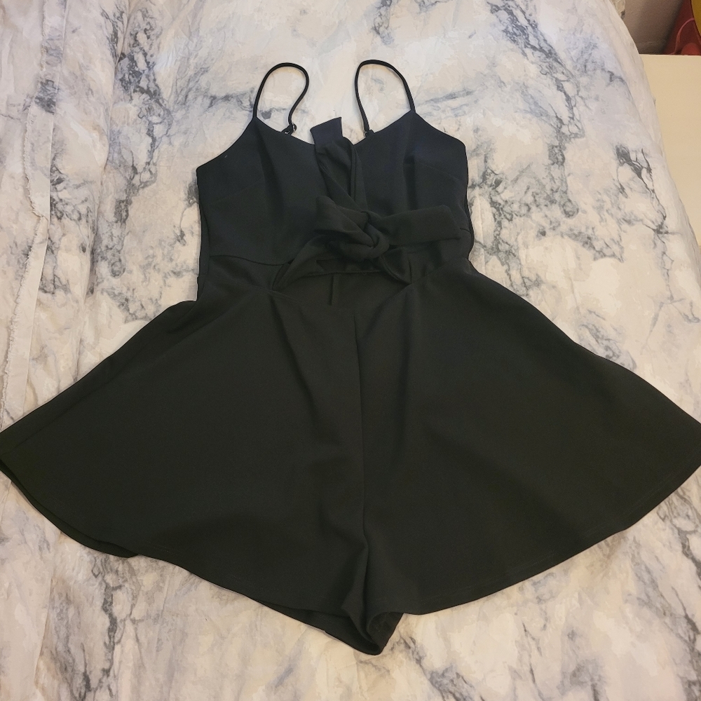Blk mini romper w bow in front